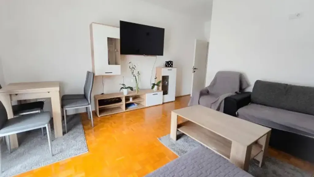 Living Room - Partially Renovated Apartment with Multiple Balconies in Merano