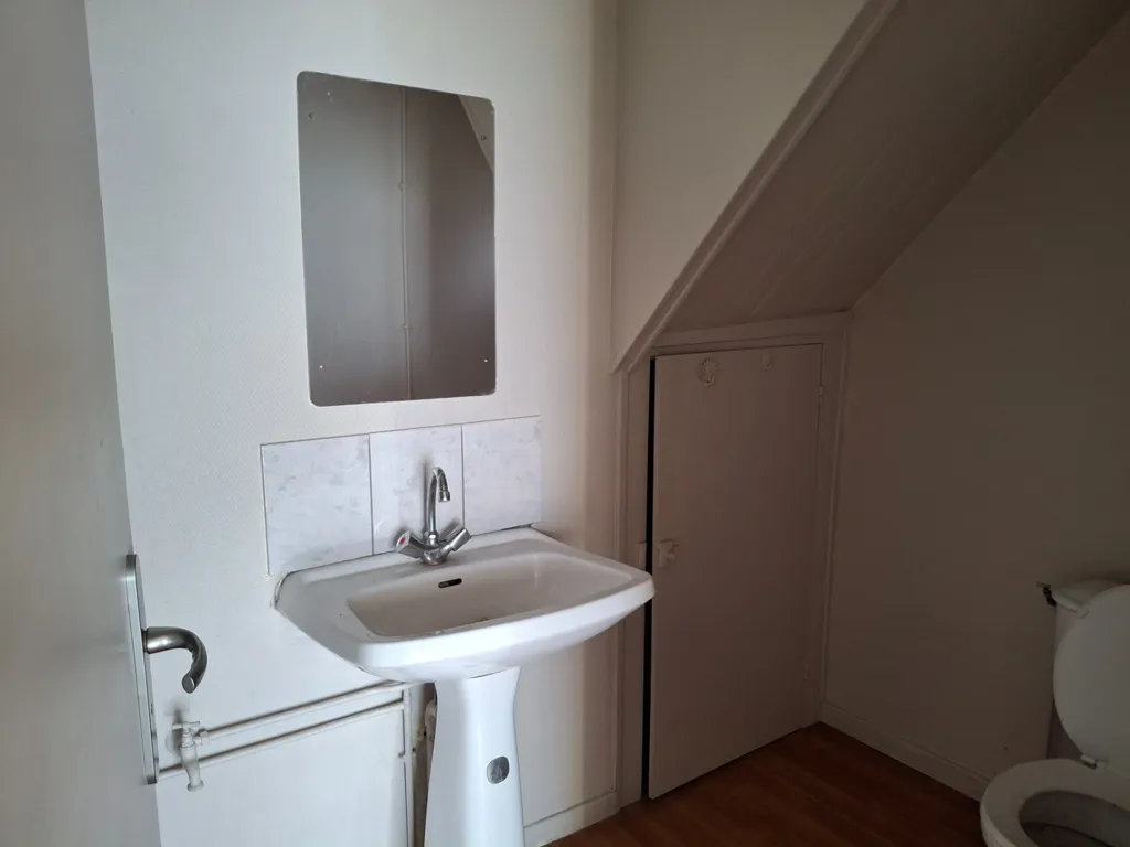 Bathrooms - Mixed-Use Building with Commercial Space in Saint-Dizier