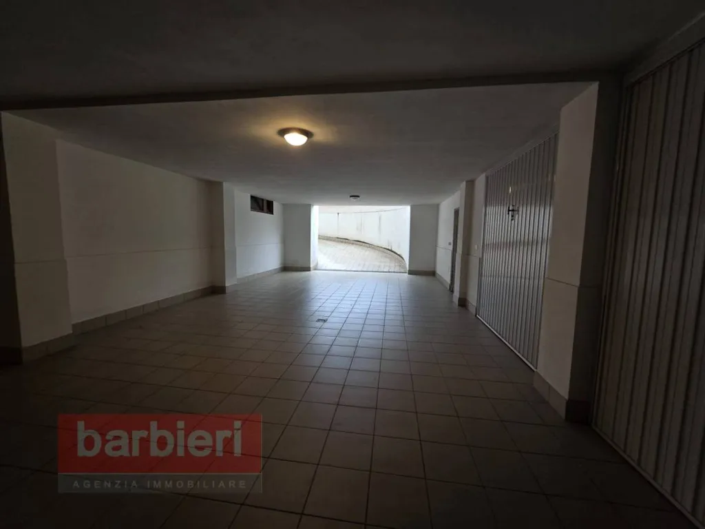 Garage - Three-Bedroom Apartment with Terrace in Cervia