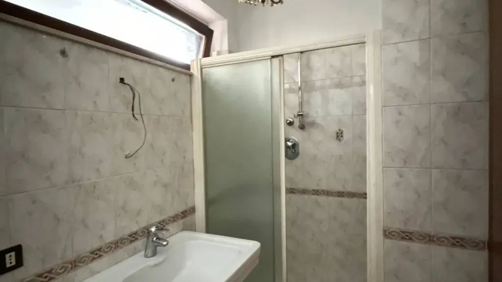 Bathrooms - Modernised Apartment with Balcony in Fermo