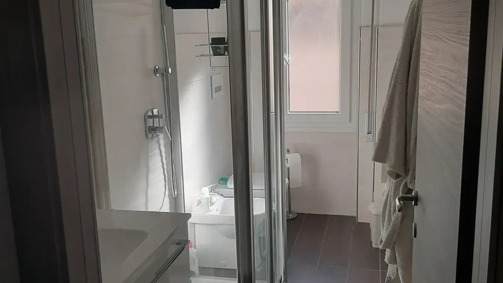 Bathrooms - Modernised Apartment with Balconies in Loano