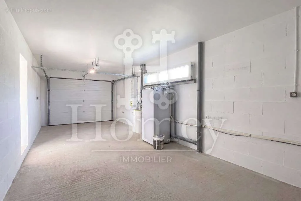 Garage - New House with Panoramic View in Echenevex