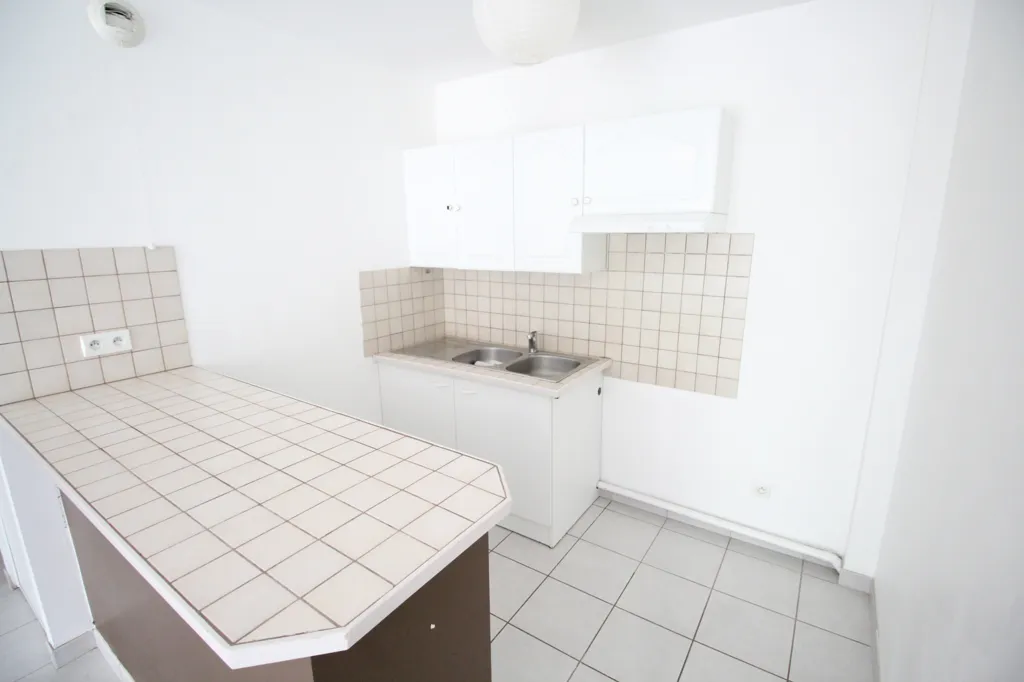 Cuisine - Appartement 3 Pièces avec Balcon à Reims