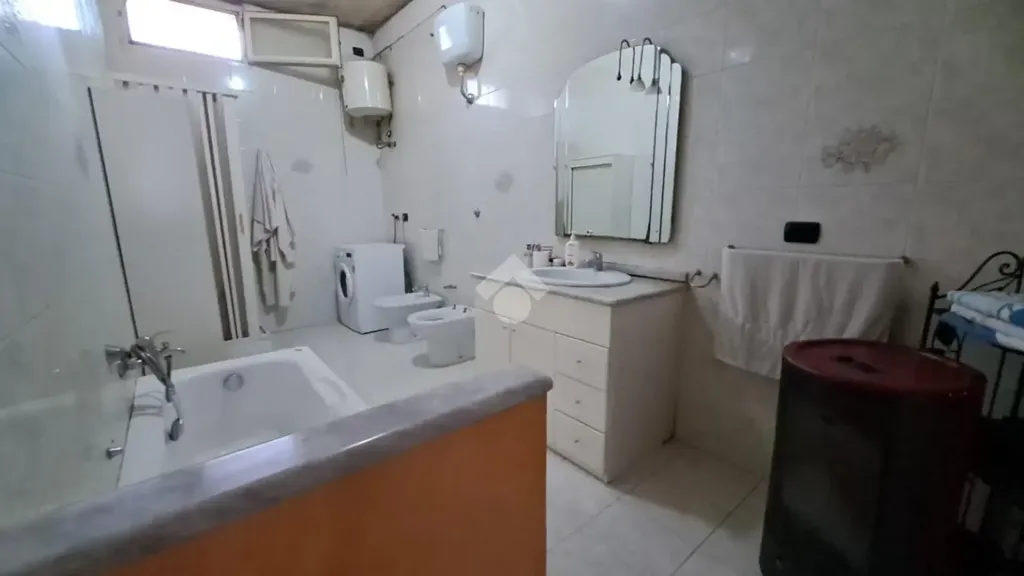 Bathrooms - Three-Bedroom Apartment with Fireplace in San Marcellino