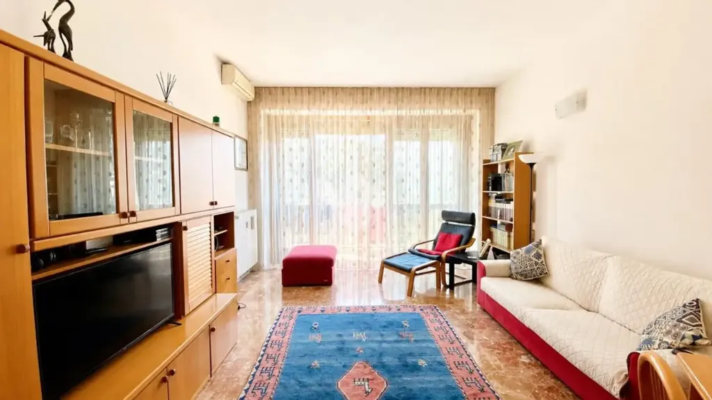 Soggiorno - Bright Triplex with Balcony in Rome