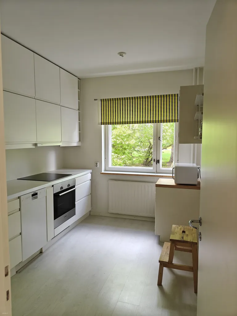 Cuisine - Bright Apartment with Balcony in Tuira, Oulu