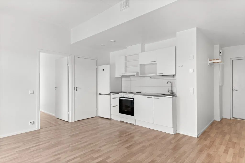 Cuisine - Efficiently Designed Apartment with French Balcony in Järvenperä