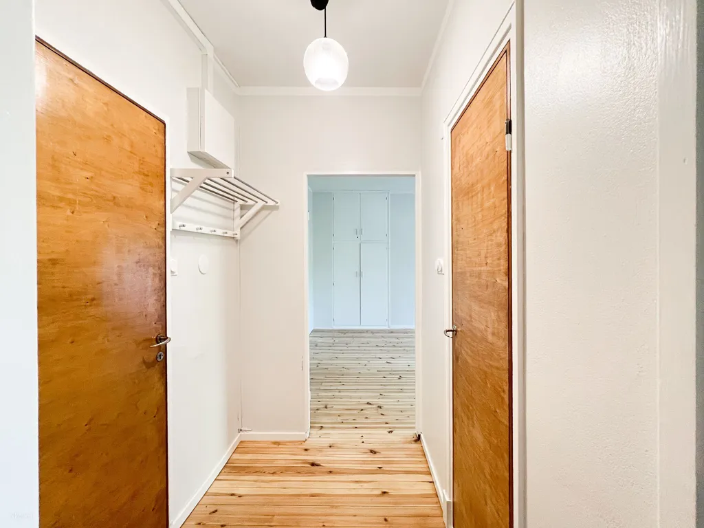 Hallway - Upper Floor Apartment with Balcony in Toukola, Helsinki