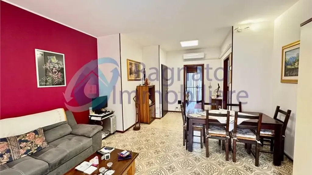 Séjour - Three-Bedroom Apartment with Balcony in Novara