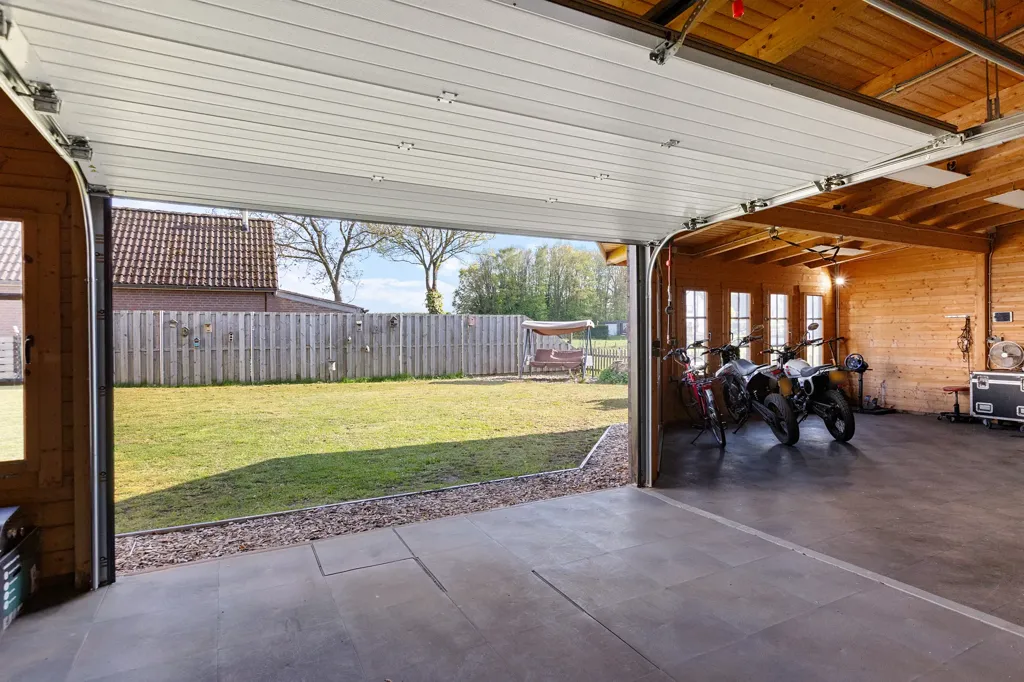 Garage - Charming Detached House with Solar Panels in Westerbeek