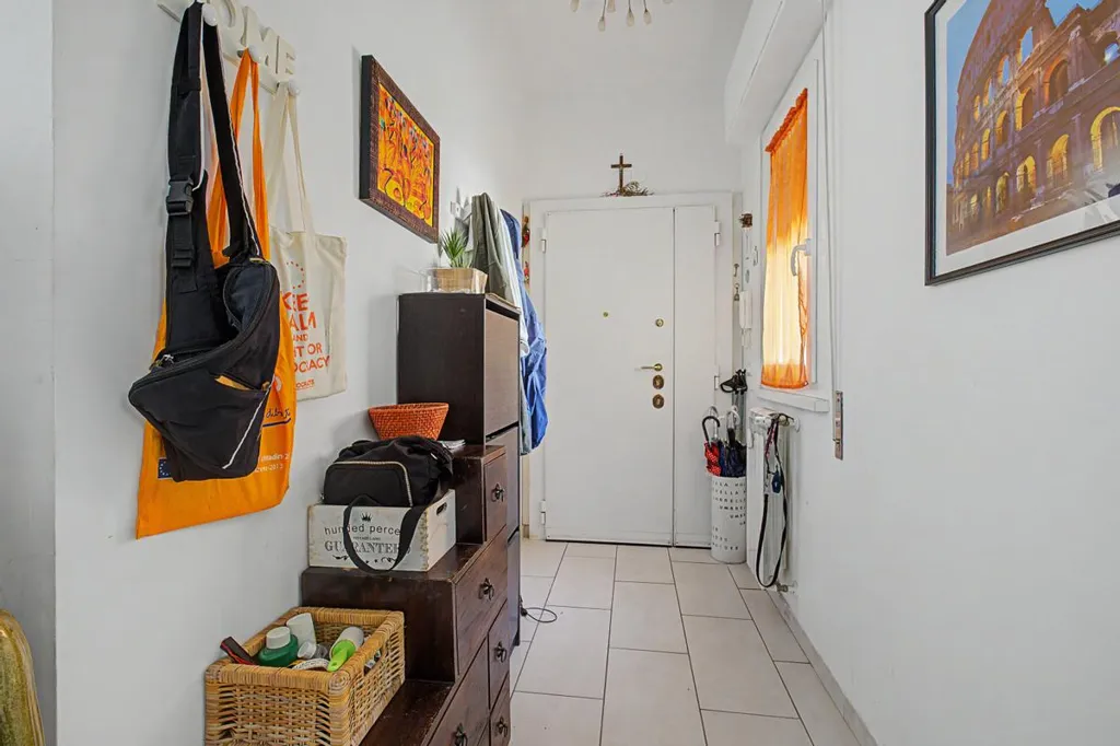 Esik - Triplex with Balcony in Ostia, Rome