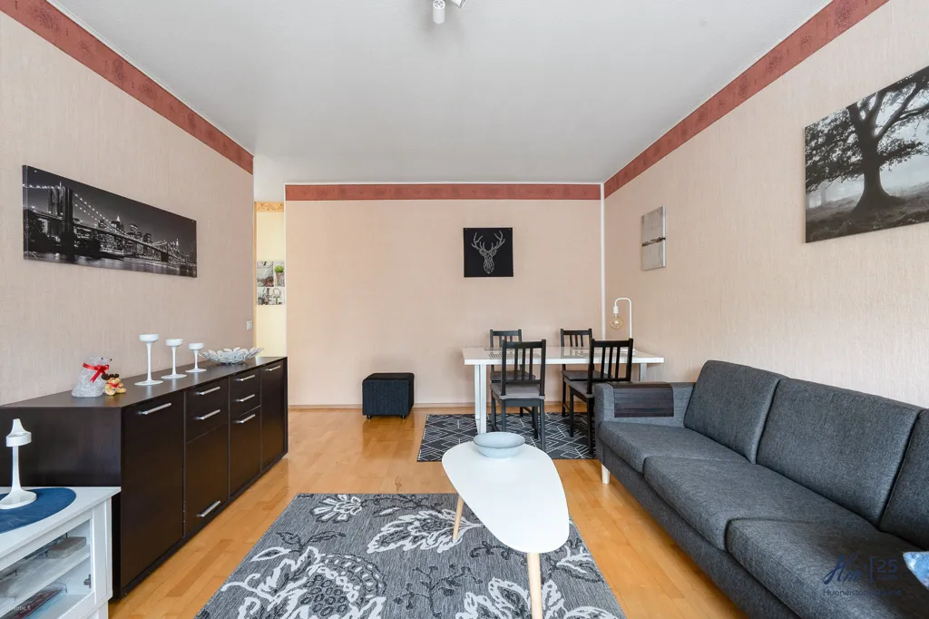 Living Room - Two-Bedroom Flat with Garden View in Runosmäki