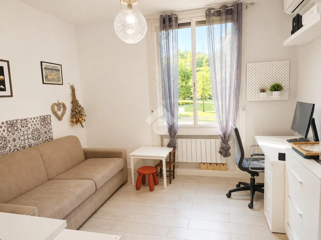 Soggiorno - Appartamento con loggia e affaccio sul verde a Basiglio