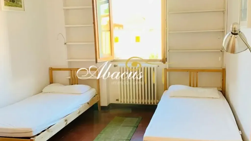 Bedrooms - Historic Apartment with Piazza View in Florence