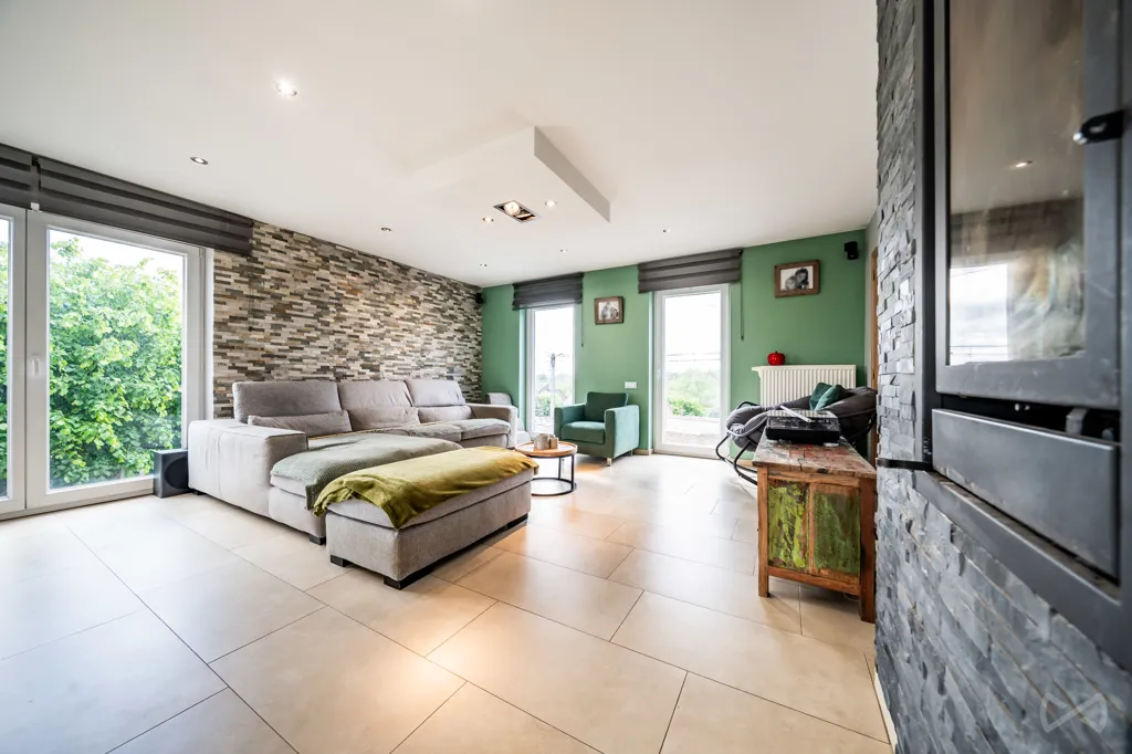Living Room - House with Photovoltaic Panels in Courcelles