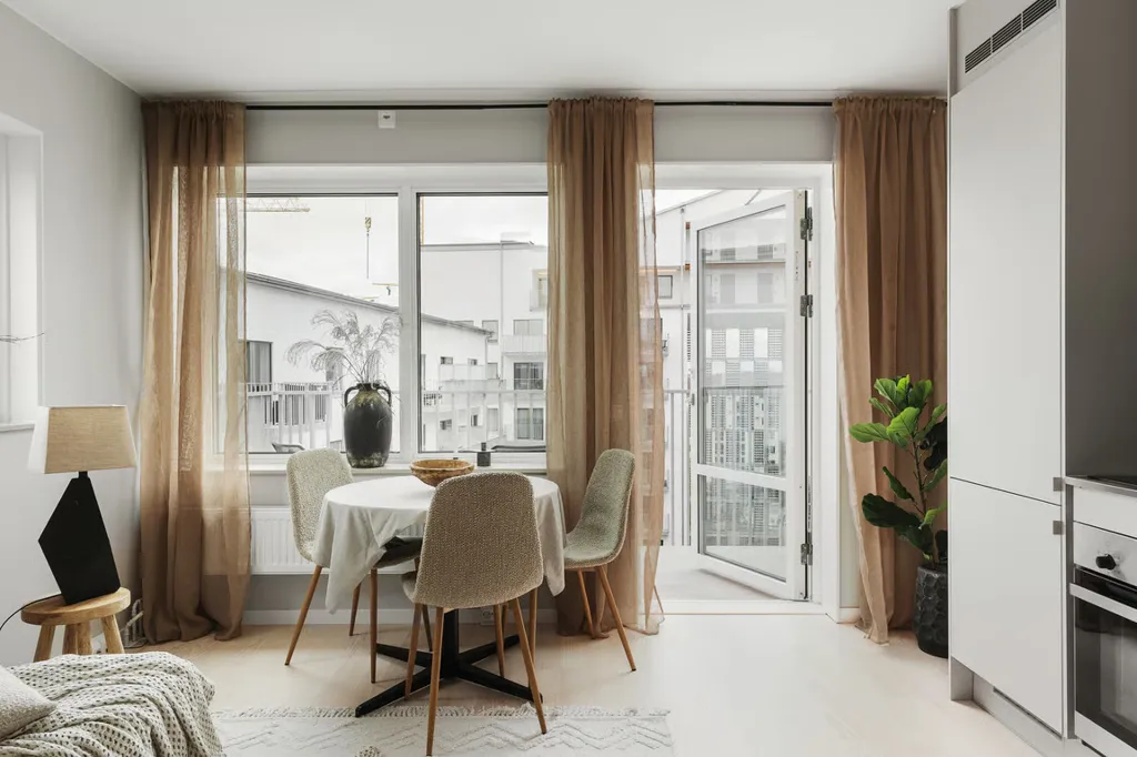 Séjour - Apartment with Balcony and Garden View in Malmö