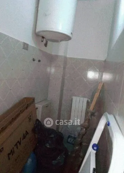 Salles de bain - Three-Bedroom Apartment in Piazza Armerina