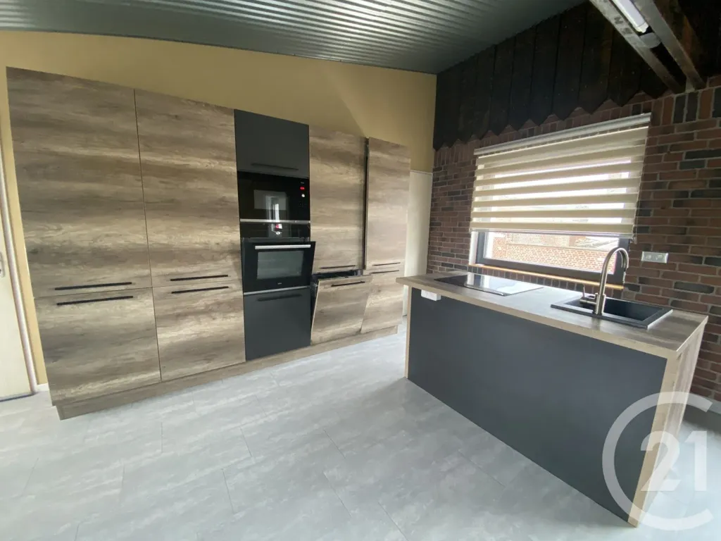 Cuisine - Appartement Moderne avec Jardin à Saint-Quentin