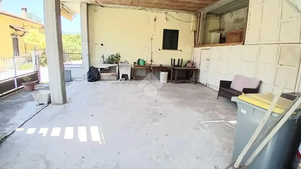 Garaaž - Two-Bedroom Apartment with Garden in Spoleto