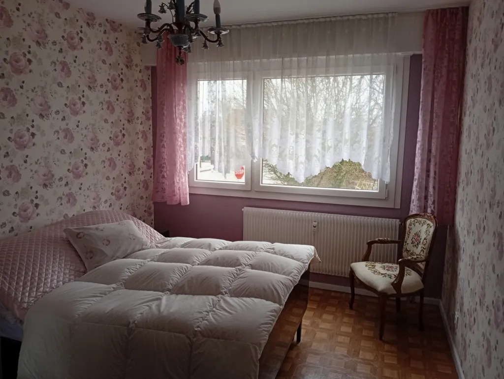 Chambres - Appartement avec jardin collectif à Bavilliers