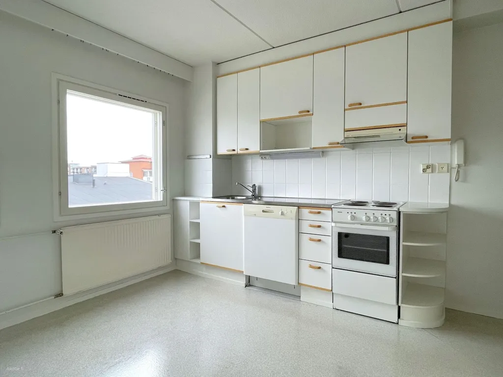 Kitchen - Spacious Apartment with Balcony in Etu-Lyötty, Oulu