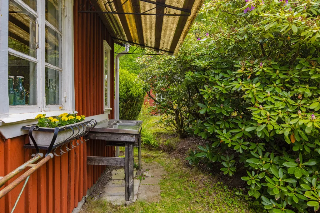 Giardino - Cottage with Loft Bed in Kållandsö