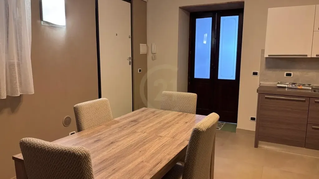 Salle à manger - Rusticated Apartment with Metro Access in Catania