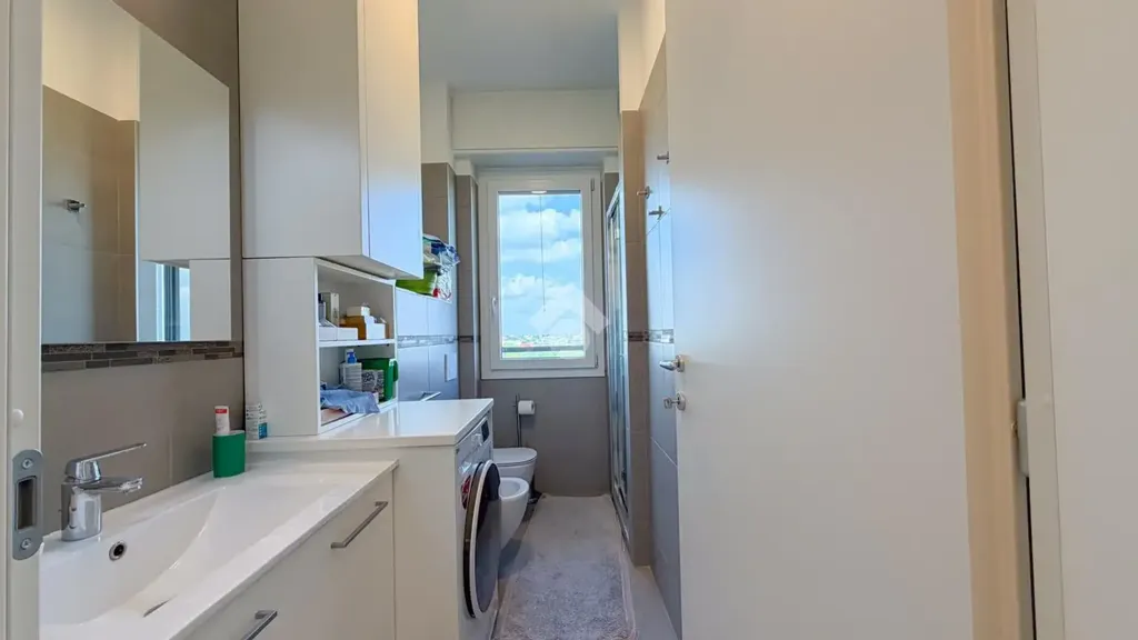 Bathrooms - Rearranged Two-Bedroom in Milan