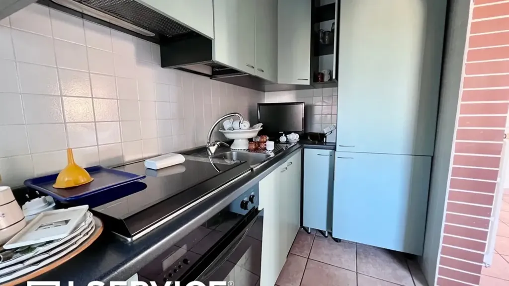 Cuisine - Three-Bedroom Apartment with Balcony in Cervia