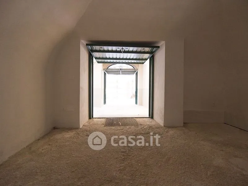 Garage - Rustic Triplex with Courtyard in L'Aquila