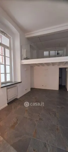 Living Room - Elegant Trilocale with Private Patio in Como