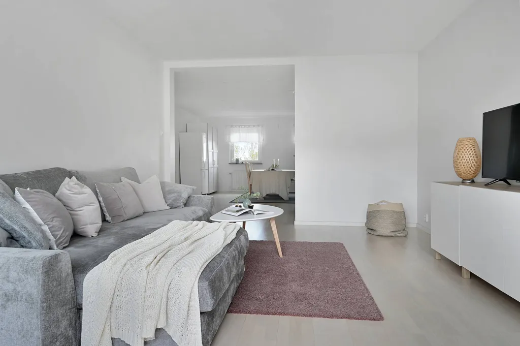 Living Room - Modern Apartment with South-Facing Balcony in Huddinge