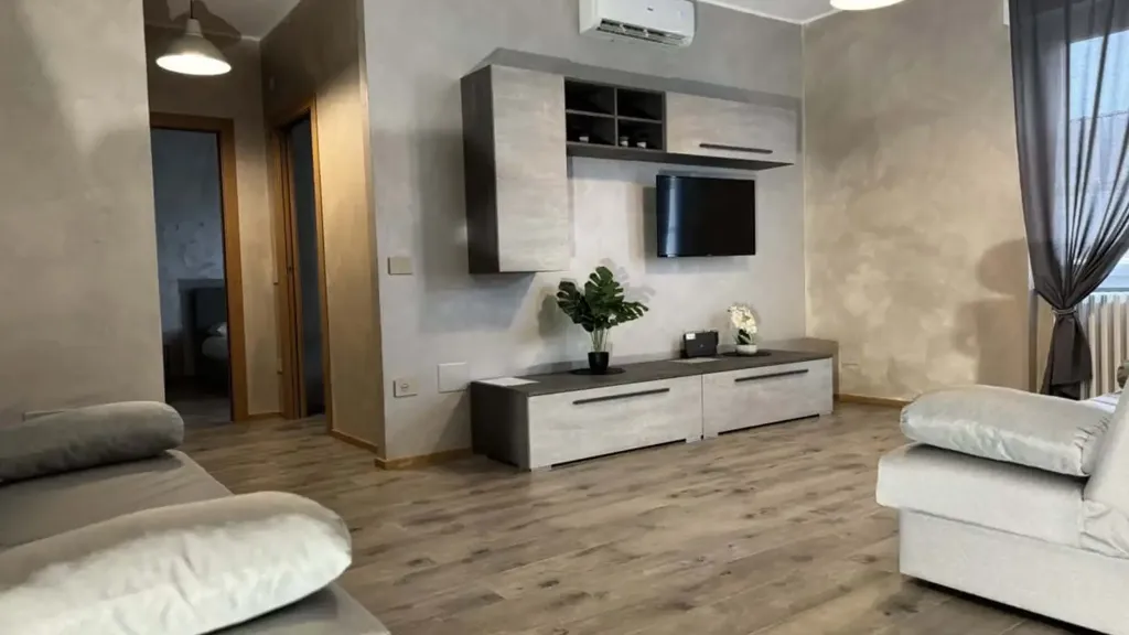 Living Room - 1-Bedroom Apartment with Private Parking in Basiglio