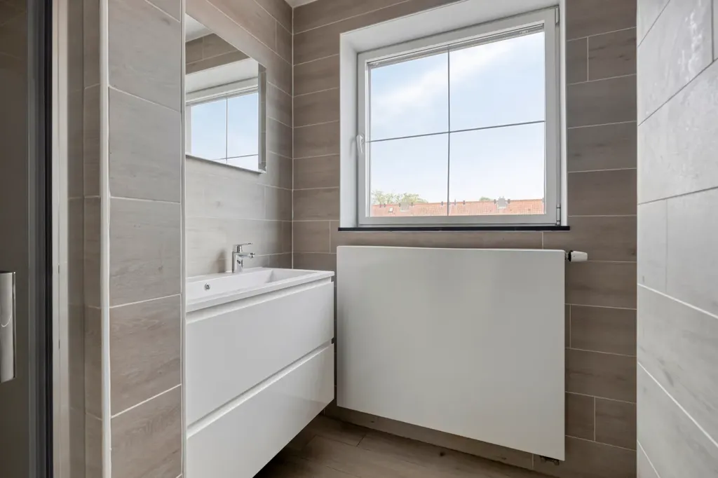 Vannitoad - Renovated Semi-detached House in Sas van Gent
