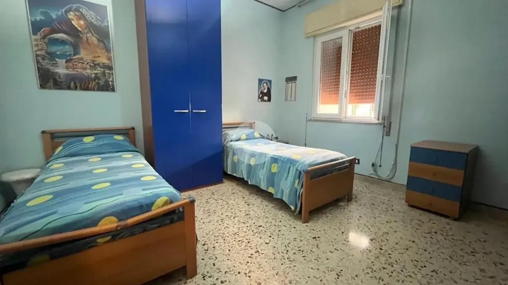 Chambres - 1970s Apartment with Balcony in Palermo
