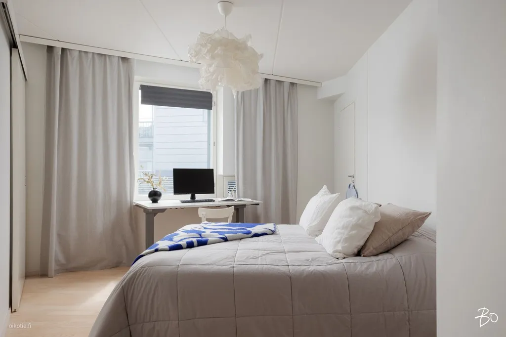 Bedrooms - Modern Apartment with Balcony in Jyväskylä Centre