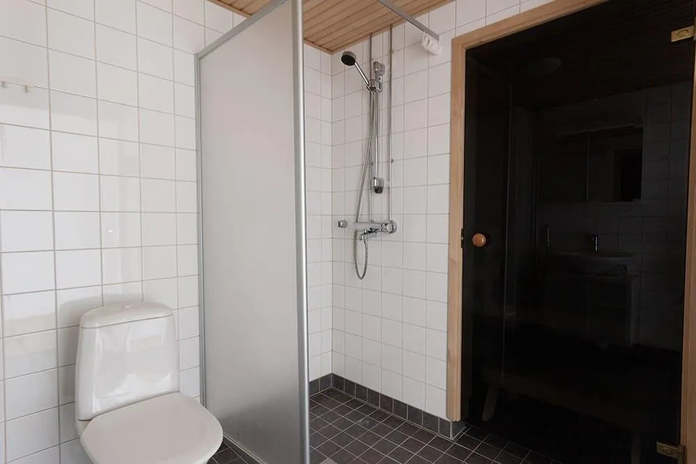Salles de bain - Three-Room Flat with Private Sauna in Turku Centre
