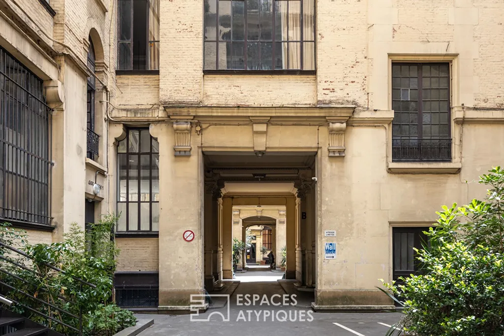 Jardin - Loft Industriel au Cœur de la Rue Martel