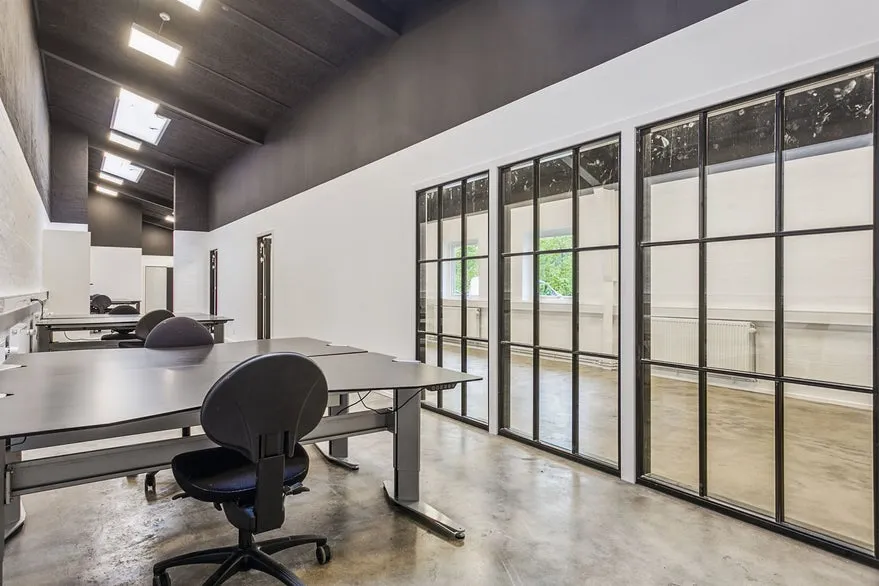 Kabinet - Open-Plan Office with Concrete Floors in Randers