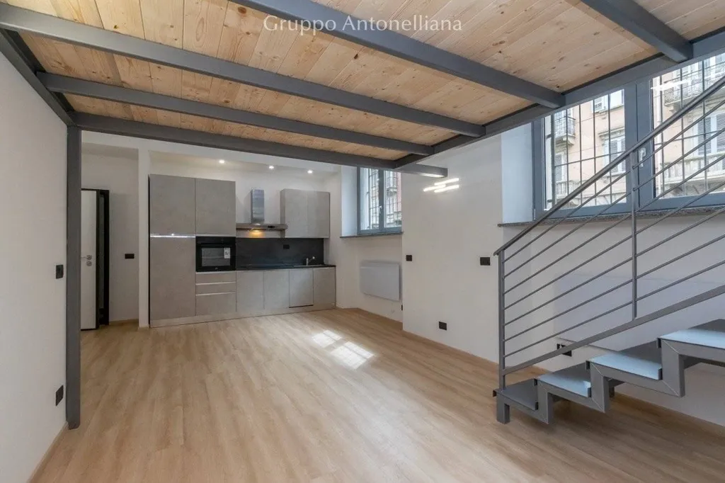 Living Room - Retrofitted Loft with South-East View in Torino
