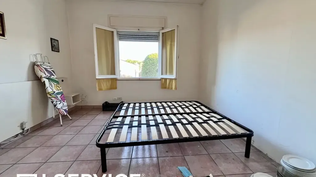 Chambres - Three-Bedroom Apartment with Balcony in Cervia