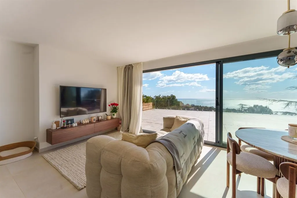 Séjour - Appartement Contemporain avec Vue Mer à l'Ouest
