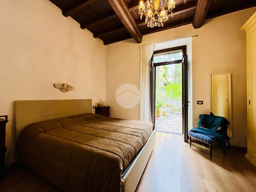 Chambres - Rear-Facing Apartment with Garden in Viterbo