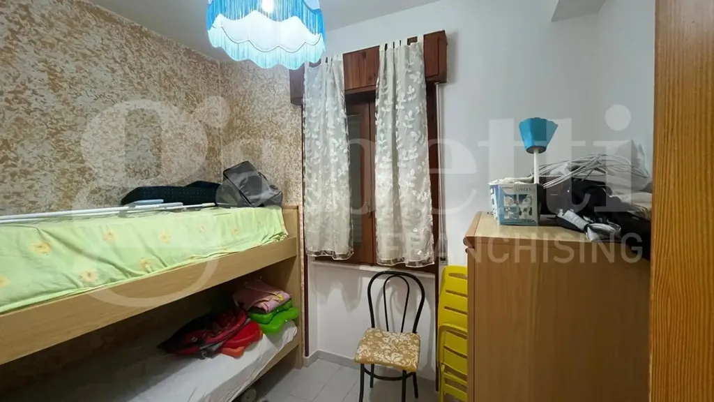 Chambres - 3-Bedroom Apartment with Balcony in Scalea
