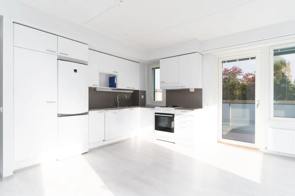 Cuisine - Three-Bedroom Apartment with Sauna in Kerava