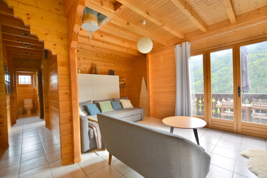 Séjour - Chalet en Madrier avec Vue Dominante à Bozel