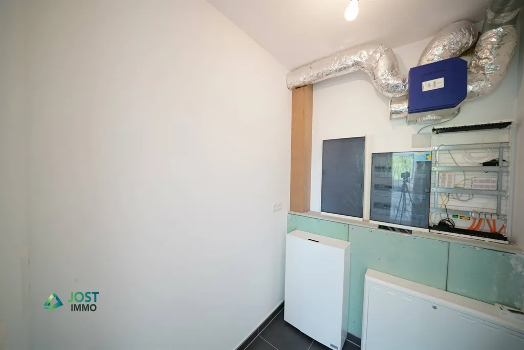 Buanderie - Appartement Moderne avec Balcon à Winseler