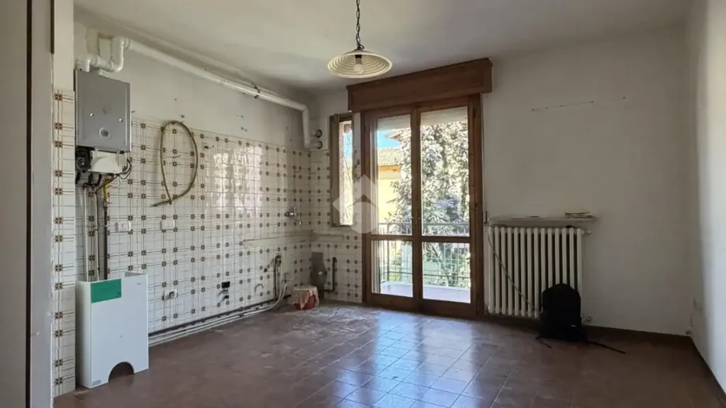 Rooms - Two-Bedroom Apartment with Balcony in Cavriago