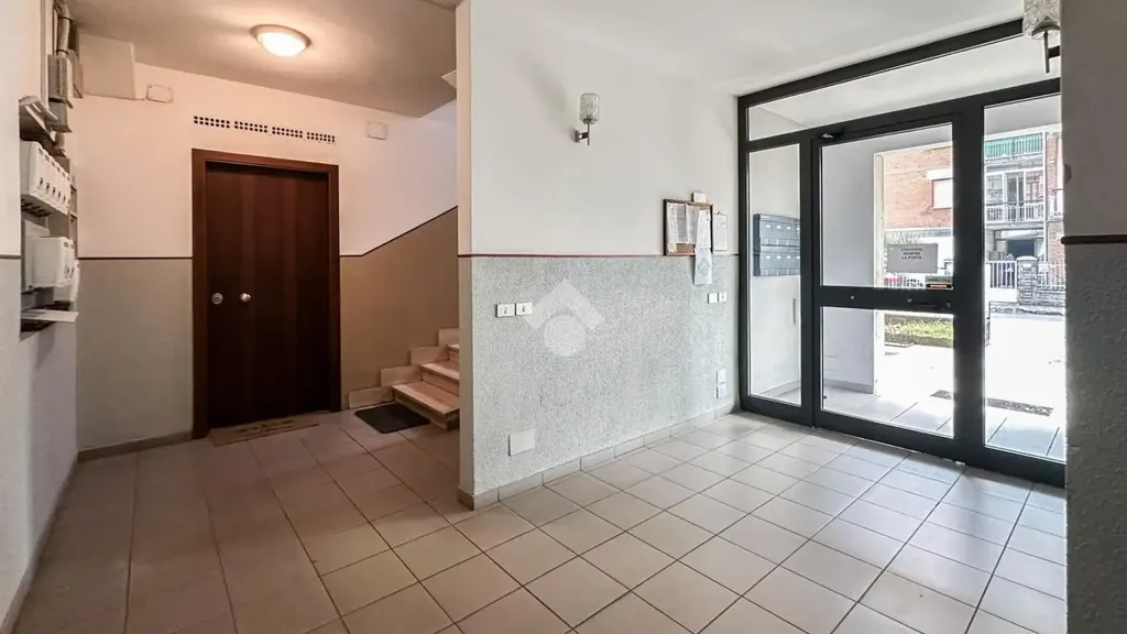 Entrée - Three-Bedroom Apartment with Balcony in Carpi