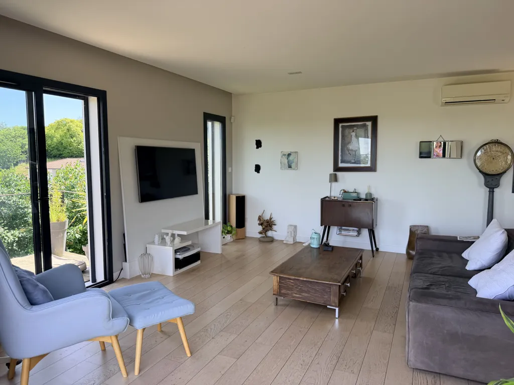 Living Room - Contemporary House with Panoramic View in Green Setting